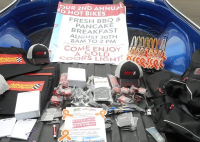 T-shirts, hats, bags, dash pads, notepads, and pens